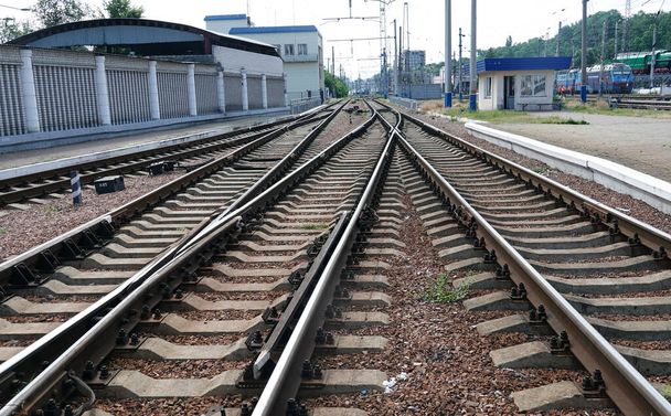 Kiev, Ukraine July 6, 2021: Railway tracks with a fork at the entrance to the station - Photo, Image