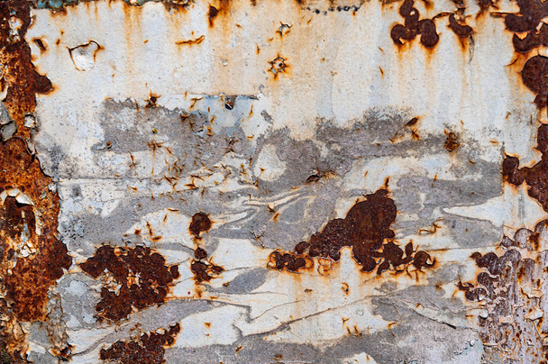 Textura metálica oxidada. Pelar pintura en la pared oxidada. - Foto, Imagen