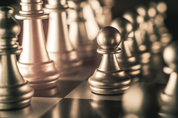 A closeup shot of chess figures on a chessboard - Photo, image