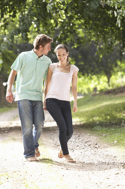 Affectionate Couple Walking In Countryside Together - Foto, Imagen