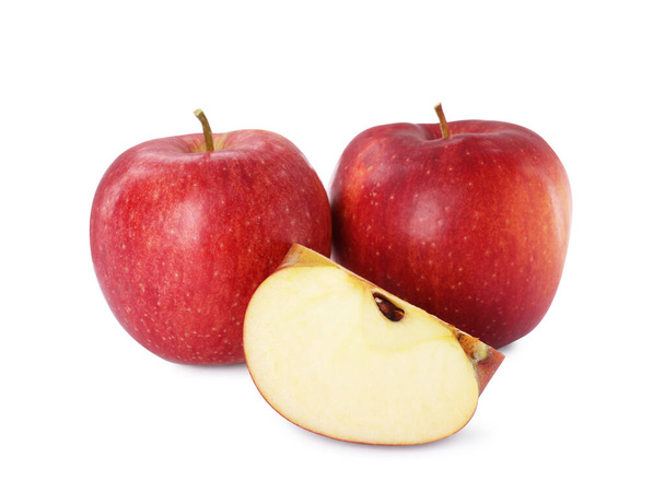 Whole and cut apples on white background - Foto, afbeelding