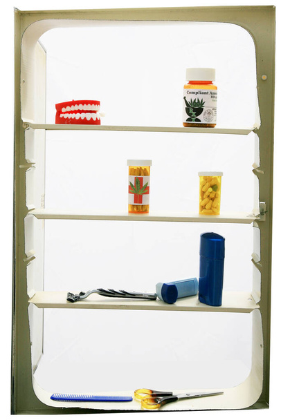 Medicine Cabinet. Prescription Marijuana in a Medicine Cabinet. isolated on white.  Medicine Cabinet with toothbrush and medicine and lotions. False Teeth. Medical Marijuana. Prescription Pills. Inhaler. Medical Marijuana. Recreational Marijuana.  - 写真・画像