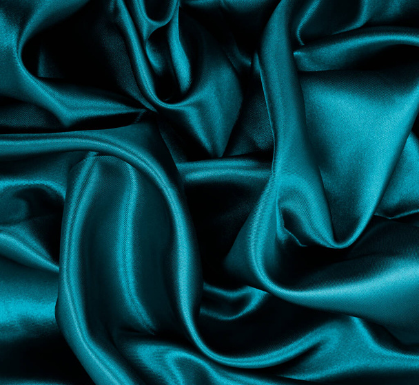 Smooth elegant blue silk or satin luxury cloth texture can use as abstract background. Luxurious background design   - Foto, afbeelding