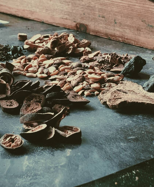 a closeup shot of a lot of different kinds of dried fruits on a wooden table - Foto, Imagen