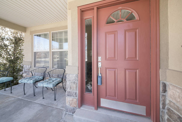 Reddish brown door with glass panel and single sidelight - Photo, Image