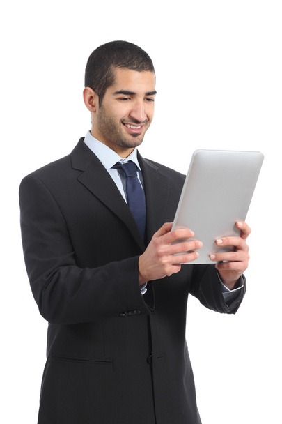 Arab businessman working reading a tablet ereader - 写真・画像