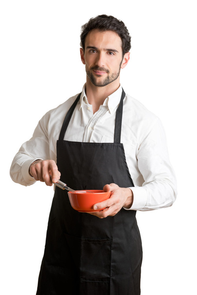 Cuisinière masculine avec tablier souriant
 - Photo, image