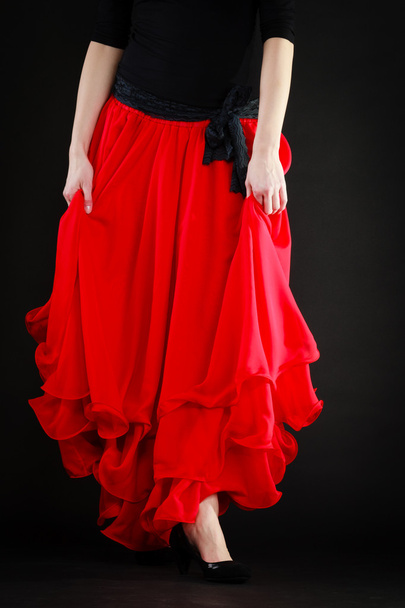 Dance. Red skirt on girl dancer dancing flamenco - Foto, Imagen