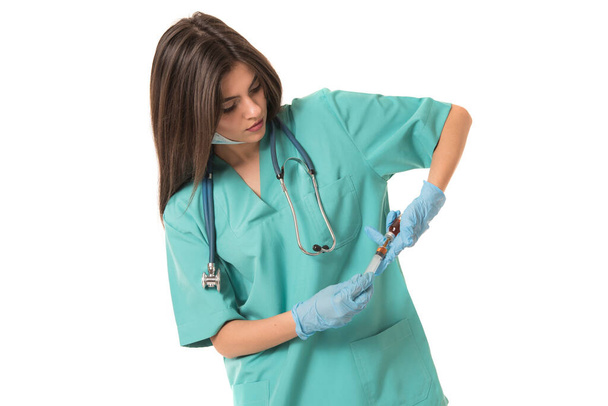 młoda kobieta lekarz z stetoskopem izolowane na białym tle - Zdjęcie, obraz
