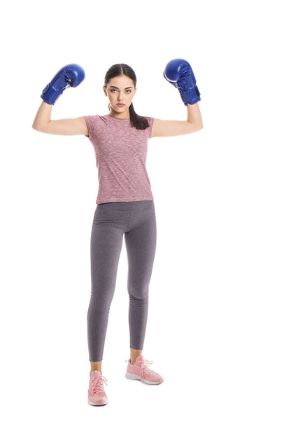 Treinador feminino esportivo em luvas de boxe no fundo branco - Foto, Imagem