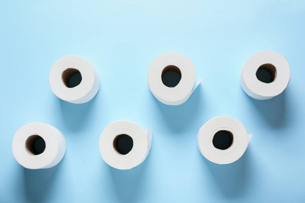 Rolls of toilet paper on color background - Photo, Image