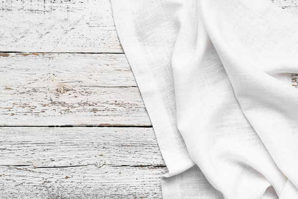 Fabric napkin on light wooden background - Photo, Image