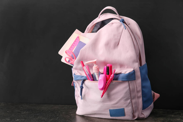 School backpack and stationery near blackboard - Valokuva, kuva