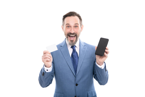 surprised ceo hold card and cell phone for paying online isolated on white copy space, buy online. - Photo, image