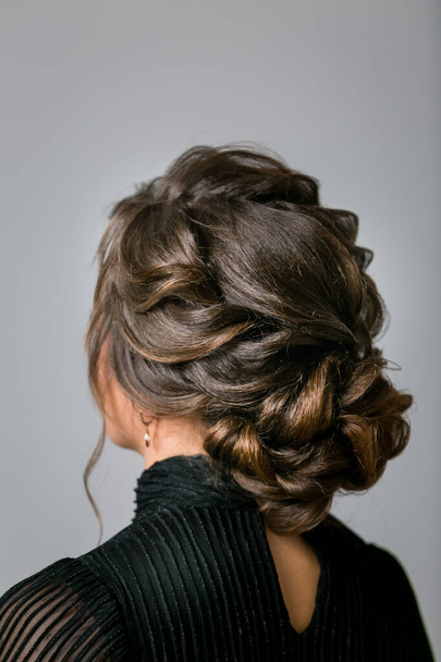 Hairstyle close up. Hairdresser does styling girl. - Photo, Image