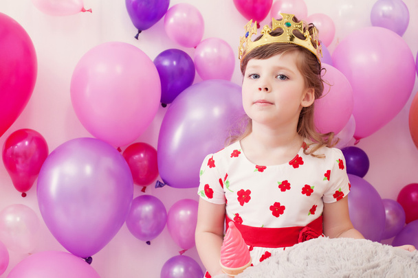 Portrait of funny girl posing in toy crown - Photo, Image