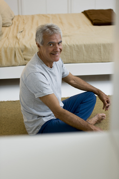 Senior man meditating - Photo, Image