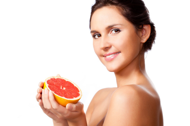 Beautiful woman portrait with half of grapefruit - Fotoğraf, Görsel