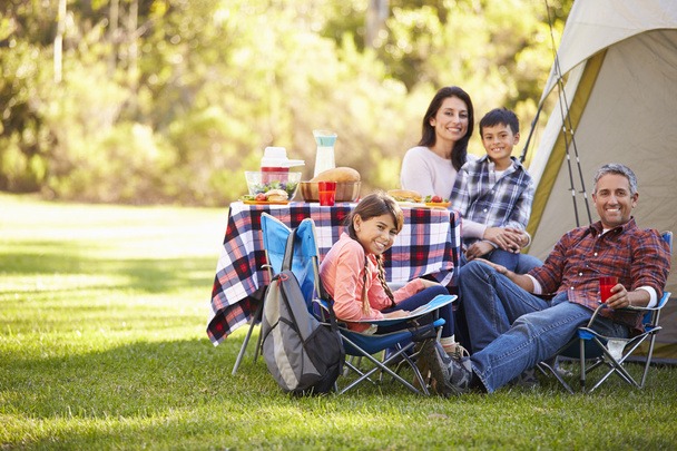 Family Enjoying Camping Holiday In Countryside - Fotoğraf, Görsel