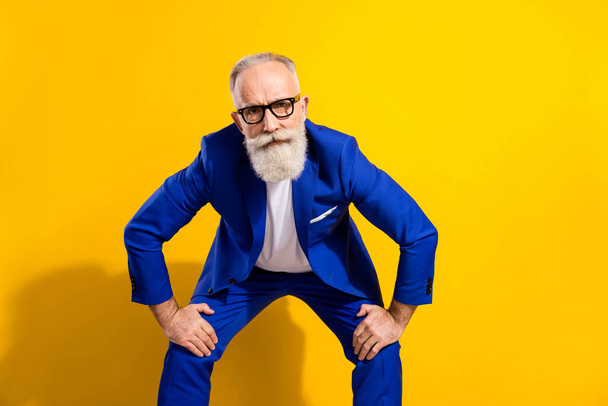 Photo of strict grey beard aged man look you wear spectacles blue jacket isolated on vivid yellow color background - Φωτογραφία, εικόνα