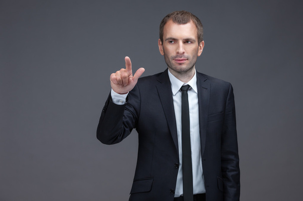 Pointing businessman - Photo, image