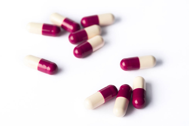 Drug prescription for treatment medication. Pharmaceutical medicament,  Pharmacy theme, Heap of red white medicament - Фото, изображение