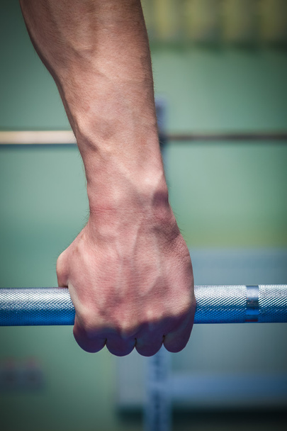 Hand holding barbell - Photo, Image