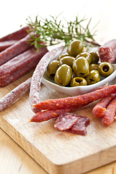 Antipasti with salami and olives - Foto, imagen