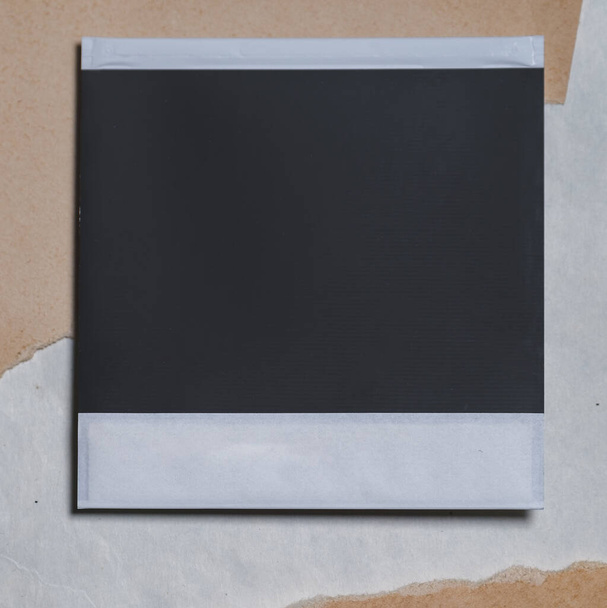 Blank photo frame on brown background as template for design. Photo card with space for your logo  - Foto, immagini