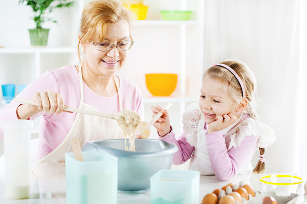 Grandmother and granddaughter making Dough - Photo, Image