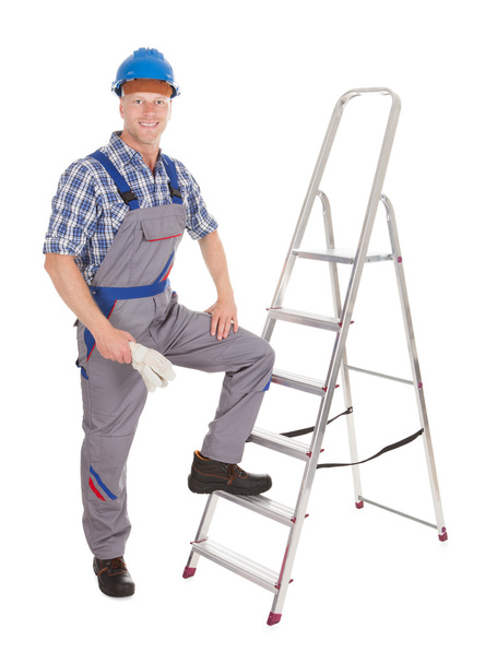 Confident Repairman With Ladder - Фото, изображение
