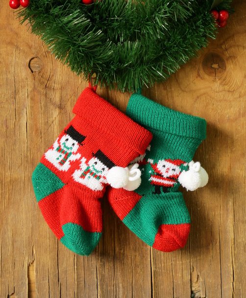 Christmas knitted socks for gifts traditional festive decoration - Fotoğraf, Görsel