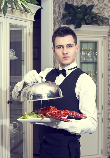 Waiter with a tray of food - Foto, imagen