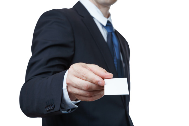 Jovem homem de negócios oferecendo um cartão de visita
 - Foto, Imagem