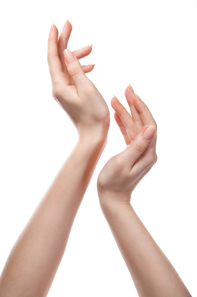 σχήμα από γυναικεία χέρια που απομονώνονται σε λευκό - Φωτογραφία, εικόνα