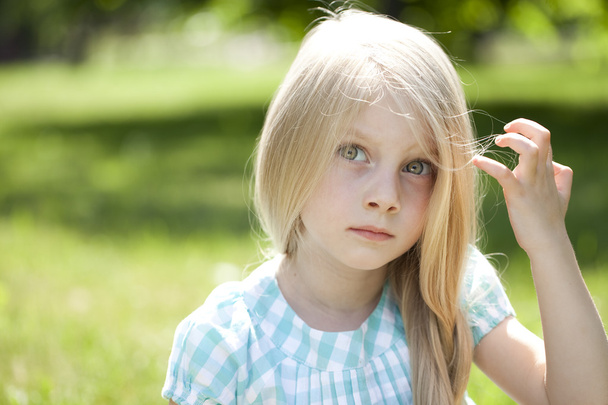 Portrait of a beautiful blonde little girl three years - Φωτογραφία, εικόνα