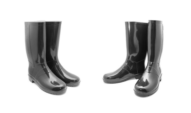 botas de goma negro sobre fondo blanco
 - Foto, Imagen