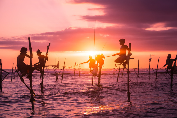 Fishermen fishing in unique style - Photo, Image