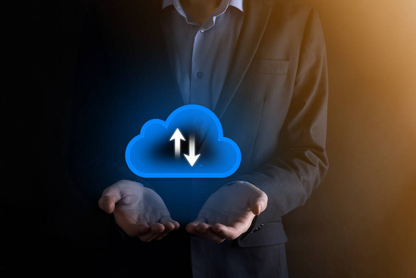 Businessman hold cloud icon.Cloud computing concept - connect smart phone to cloud. computing network information technologist with smart phone.Big data Concept - Photo, Image
