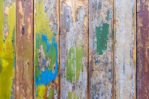 Colorful painted wood wall - texture or background. - 写真・画像