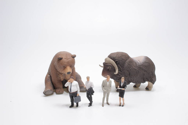 the mini figure of business,  bull  and bear  - Photo, Image