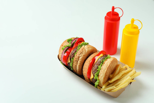 Concept van fast food op witte achtergrond - Foto, afbeelding
