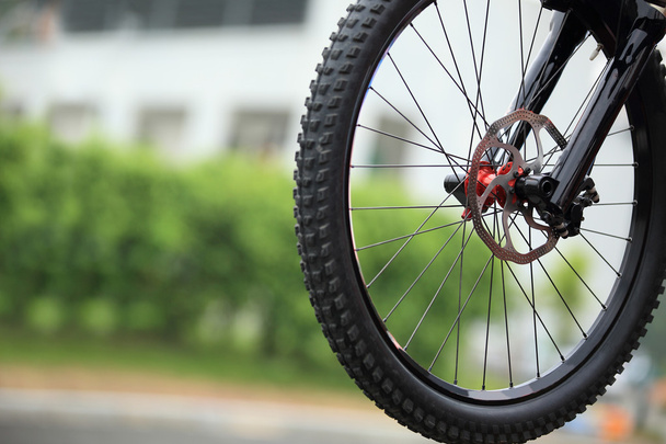 Close-up of modern bike tire cycling outdoors in city  - Φωτογραφία, εικόνα