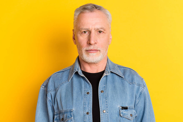 Photo of confident old man wear jeans blazer isolated on vibrant yellow color background - Valokuva, kuva