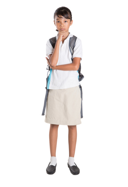Chica en uniforme escolar y mochila
 - Foto, Imagen