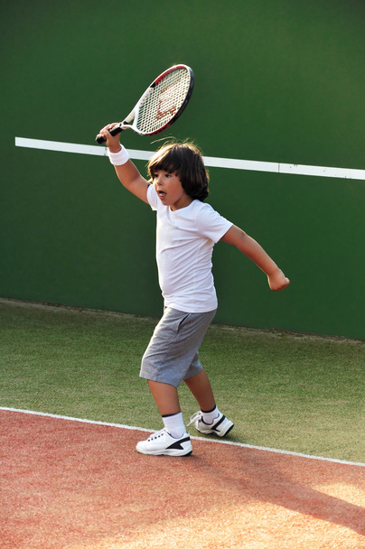 Young boy play tennis - Photo, Image