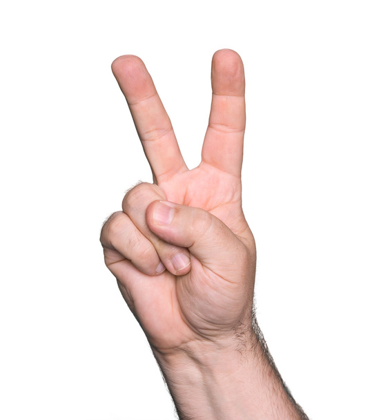 man hand tonen het teken van de overwinning - Foto, afbeelding