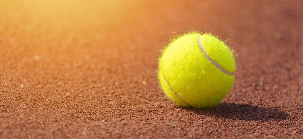 Tennis ball on a tennis clay court. Professional sport concept - Foto, immagini