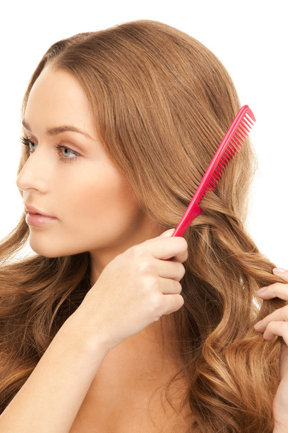 Bright picture of beautiful woman with comb - Foto, imagen