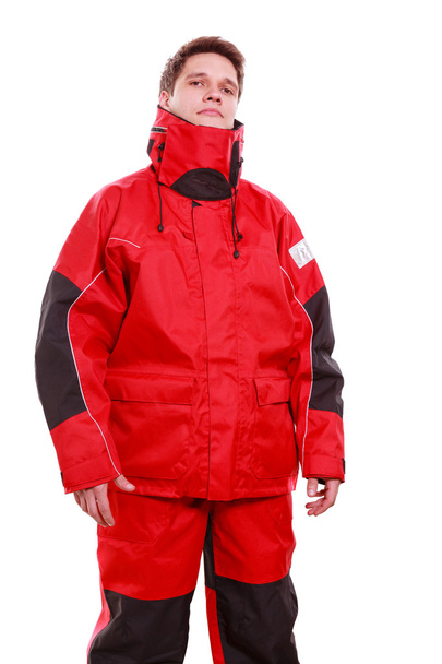 Young man sailor in red wind jacket. - Foto, afbeelding